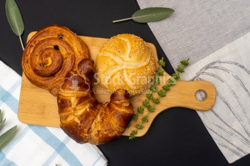 Cooking board with some breads on top
