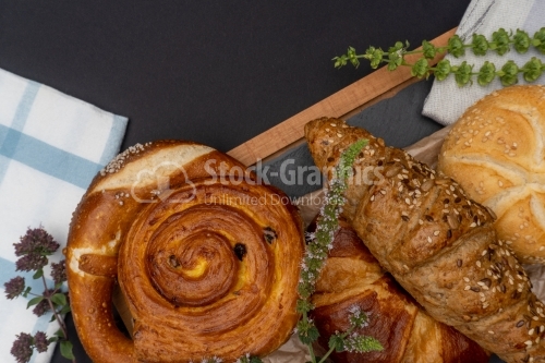 Dark bread arangement on cooking board