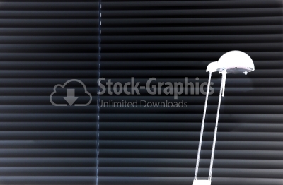 Desk lamp and window shades abstract background
