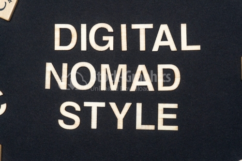 DIGITAL NOMAD STYLE word written on dark paper background. DIGITAL NOMAD STYLE text for your concepts