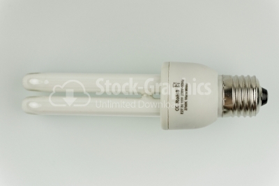 Energy saving fluorescent light bulb on white bakground - Stock 