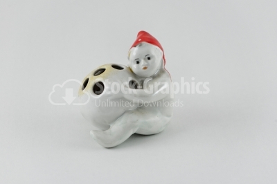 Figure porcelain kid and ball