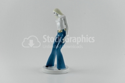 Girl in jeans porcelain statuette on white background