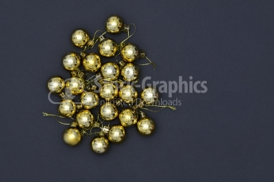 Gold Christmas Ornaments on Gray Background