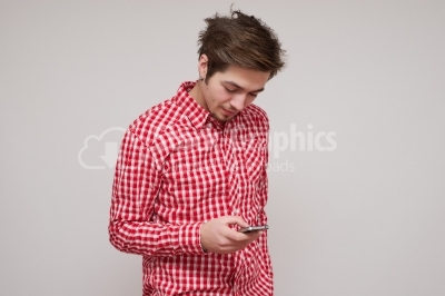 Guy texting on his smart phone