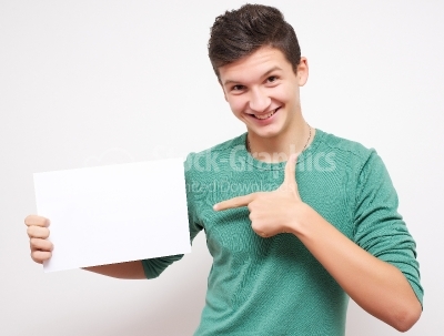 Happy smiling young business man showing blank signboard, isolat