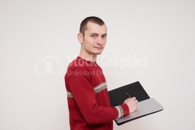 Happy smiling young man with black folder, isolated over white b