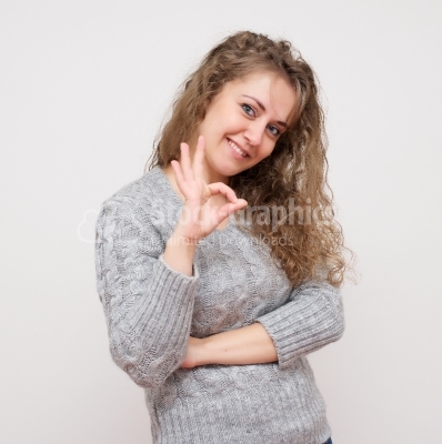 Happy young business woman with facial expressions