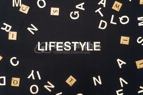 LIFESTYLE word written on dark paper background. LIFESTYLE text for your concepts
