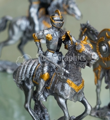 Military knight with a sword and helmet