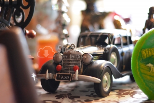 Mini vintage car model in a boutique.