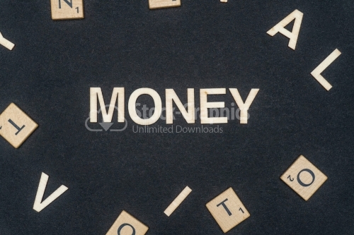 MONEY word written on dark paper background. MONEY text for your concepts