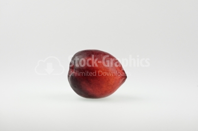 Nectarine on white background - Stock Image