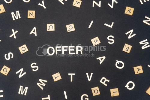 OFFER word written on dark paper background. OFFER text for your concepts