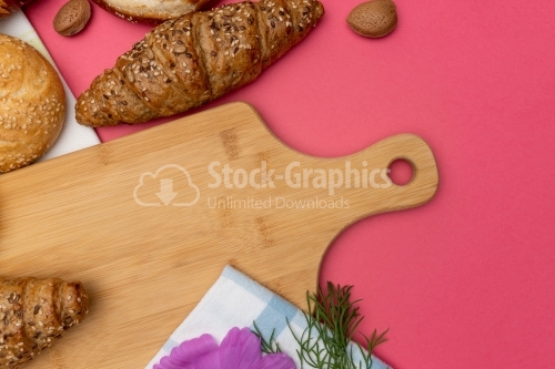 Pastry on wood cooking board 