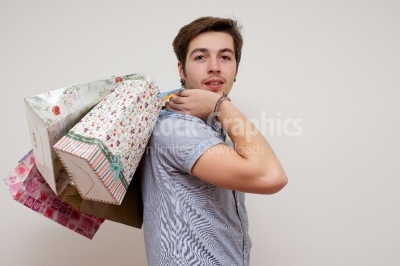 Picture of handsome with shopping bags.