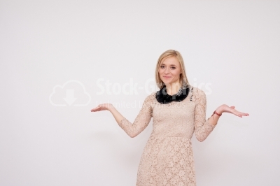 Picture of Young Woman With Questioning Arm Gesture