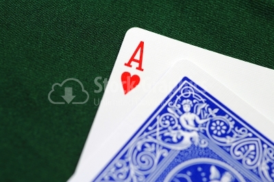 Playing cards - isolated on green background