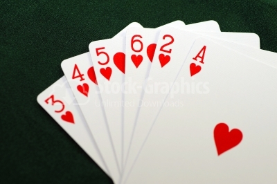 Playing cards - isolated on green background