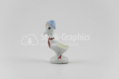 Porcelain duck on white background- Stock Image