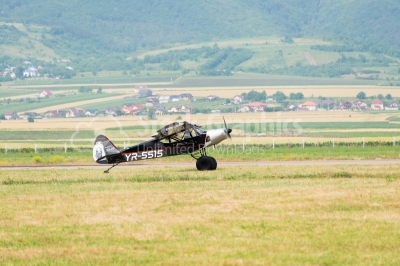 Propeller plane lands on runway 
