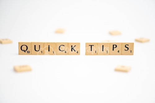 QUICK TIPS word written on white background. QUICK TIPS text on white