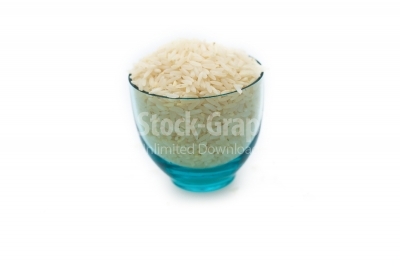 Rice on transparent blue glass