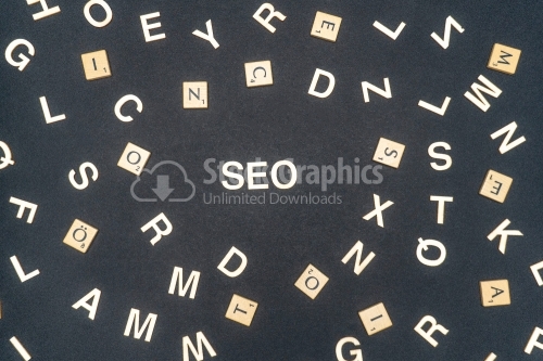 SEO word written on dark paper background. SEO text for your concepts