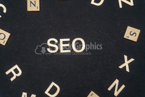 SEO word written on dark paper background. SEO text for your concepts