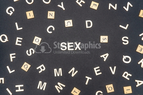 SEX word written on dark paper background. SEX text for your concepts