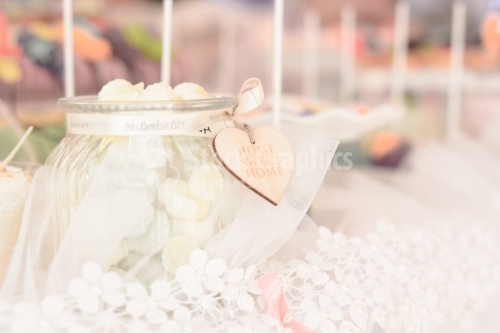 Small home white meringue in a glass jar. Homemade Meringue.