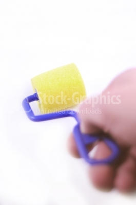 Small paint roller - Stock Image