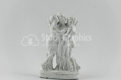 Statuete of 3 women photo on white