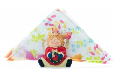 Table napkin holder with colorful napkins