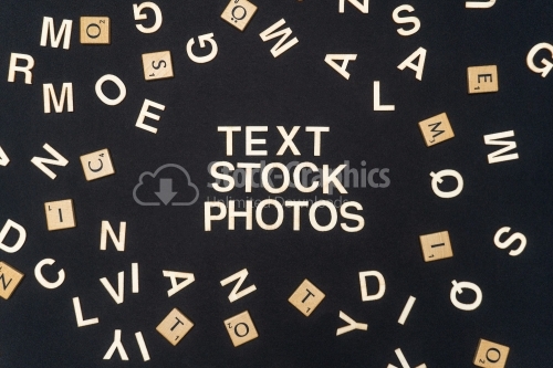 TEXT STOCK PHOTOS word written on dark paper background. TEXT STOCK PHOTOS text for your concepts