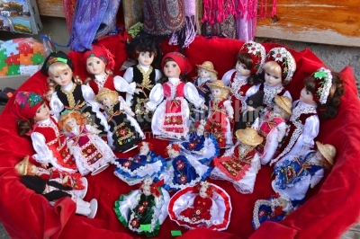 Traditional porcelain dolls for sale in a souvenir store in Bran