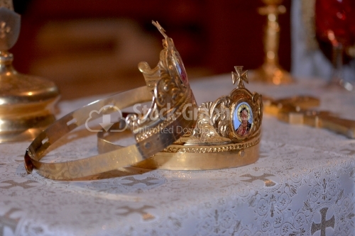 Two orthodox wedding ceremonial gold crowns ready for ceremony