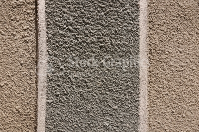 Wall texture sliced by white areas
