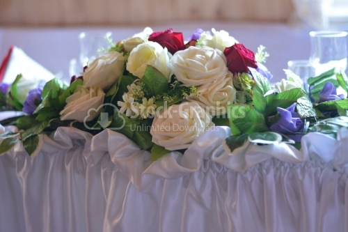 White bouquet of roses on the table