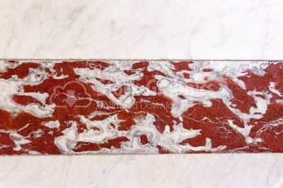 White marble background with a stripe red marble