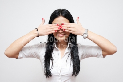 Woman covering her eyes