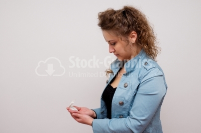 Woman holding  clock 