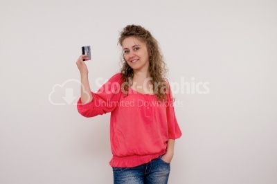 Woman holding credit card 
