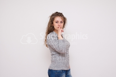 Woman Making A Keep It Quiet Gesture