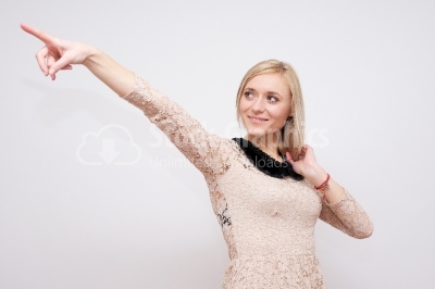 Woman pointing isolated - Stock Image