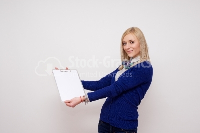 Woman showing a white clipboard
