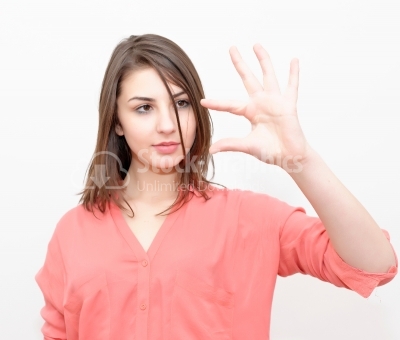 Woman showing small amount of something with fingers, isolated o