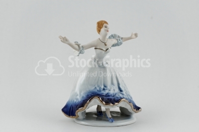 Woman statuette on white- Stock Image