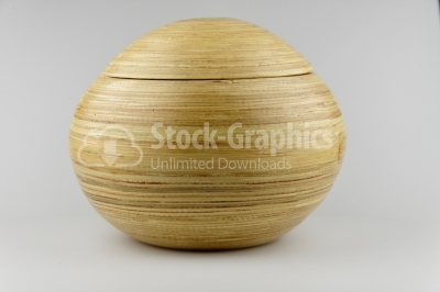 Wooden bowl on white