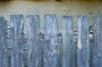Wooden fence on old background